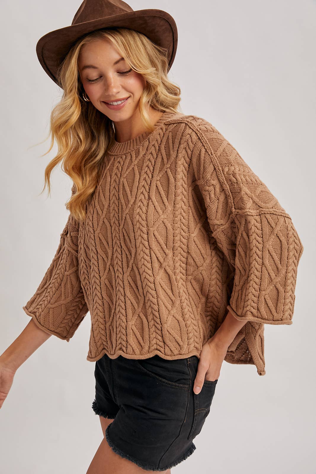 OVERSIZED BELL SLEEVE CABLE KNIT SWEATER